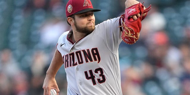 Slade Cecconi pitches for the Diamondbacks