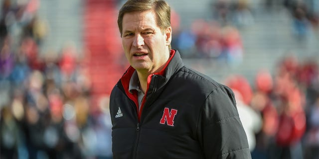 Trev Alberts on the field before a game