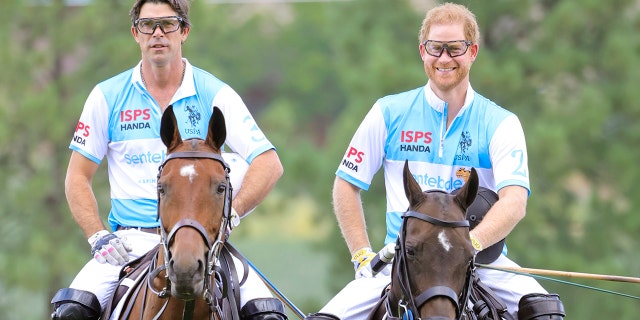 Ignacio Figueras and Prince Harry wearing matching polo uniforms while riding horses