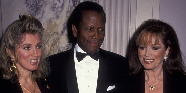 Sidney Poitier, wife Joanna Shimkus wearing formal wear at a Hollywood party