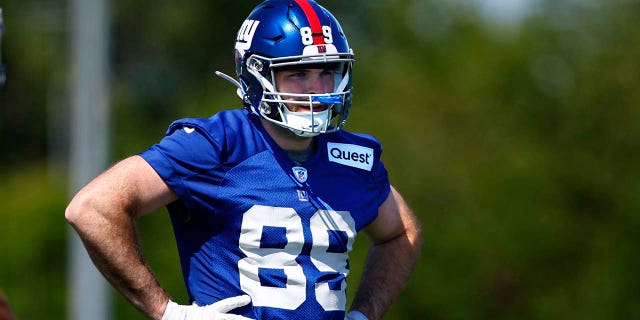 Tommy Sweeney looks on during a Giants practice