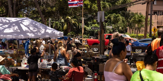 Displaced Hawaiian residents at a distribution center for aid