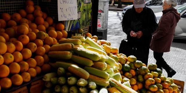 Man buying fruit