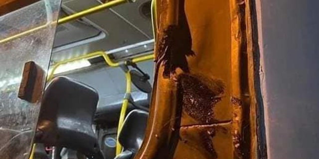 A photo of the pole, the bus