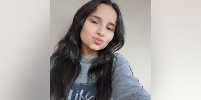 Smiling photo featuring Fernanda Pacheco Ferraz