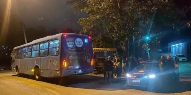 A bus, street lights