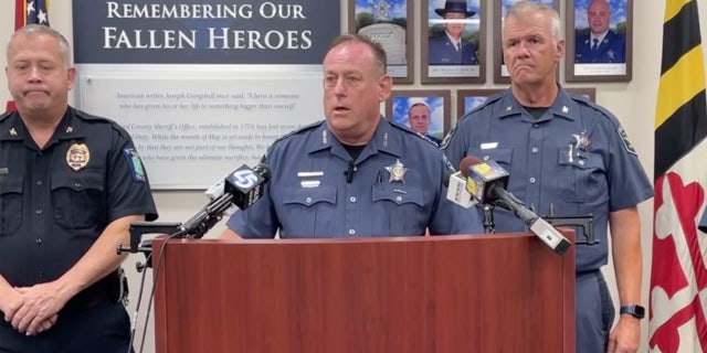 Sheriff Jeff Gahler stands at a podium.
