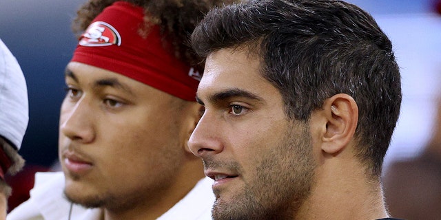 Jimmy Garoppolo and Trey Lance next to each other