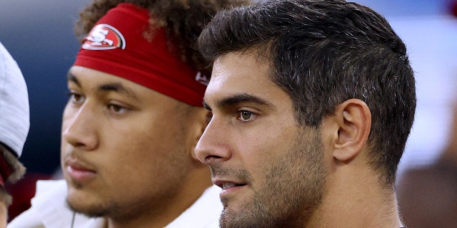 Jimmy Garoppolo and Trey Lance next to each other