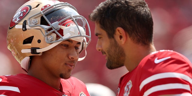 Jimmy Garoppolo and Trey Lance next to each other