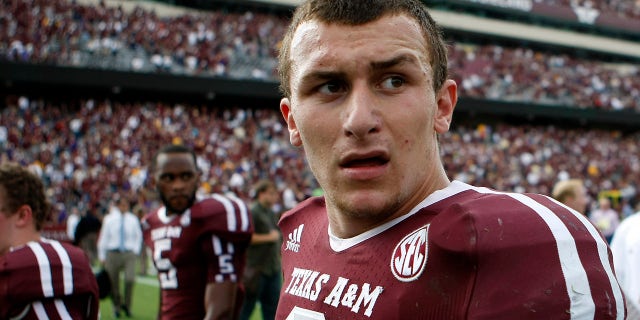 Johnny Manziel walks off the field