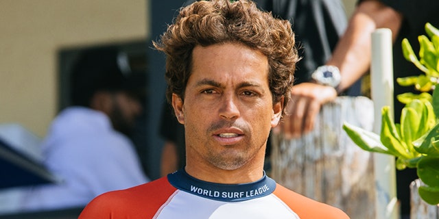 Pro surfer Kai Lenny bashes government for lack of aid amid Maui wildfires: 'We were just in shock' 4 Kai Lenny looks on beach
