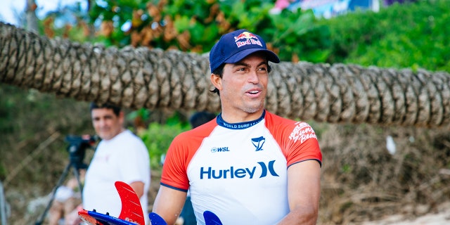 Pro surfer Kai Lenny bashes government for lack of aid amid Maui wildfires: 'We were just in shock' 3 Kai Lenny looks on beach