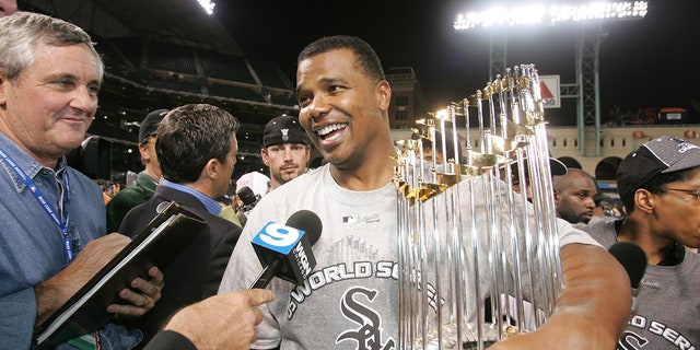 Ken Williams with World Series trophy