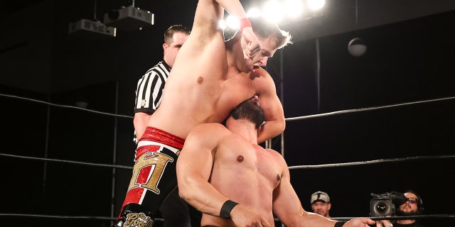 Kerry Morton hits Matt Vine