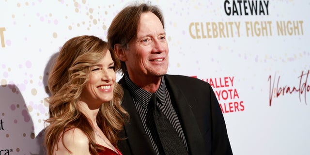 Sam Sorbo and Kevin Sorbo pose together on the red carpet