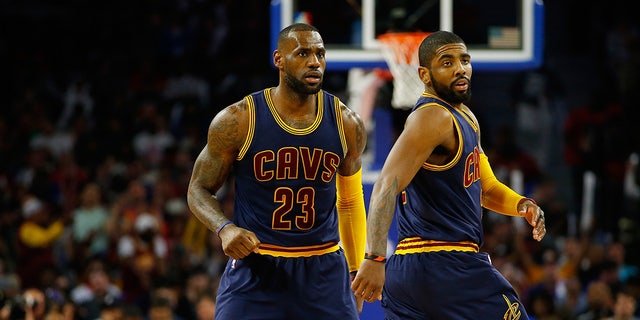 LeBron James and Kyrie Irving on court