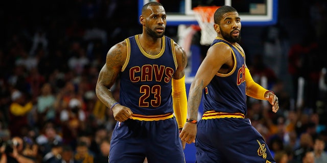 LeBron James and Kyrie Irving on court