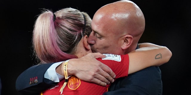 Luis Rubiales kisses Spain player on cheek