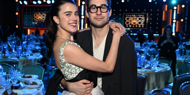 Margaret Qualley and Jack Antonoff hug