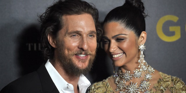 Matthew McConaughey and Camila Alves attend a premiere