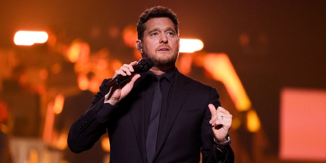 Michael Buble onstage with microphone