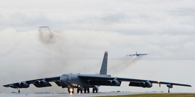 A B-52H Stratofortress taxis down the runway at Minot Air Force 