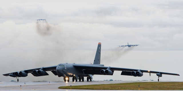 A B-52H Stratofortress taxis down the runway at Minot Air Force 