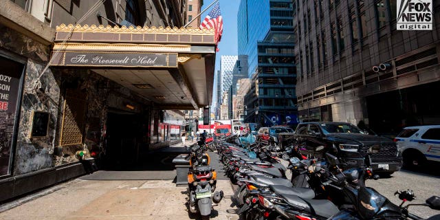 Migrants arrive at the Roosevelt Hotel in Manhattan