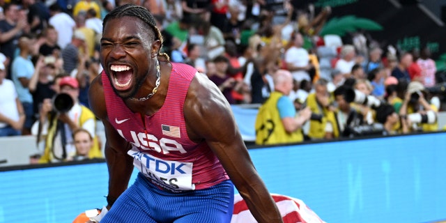 Noah Lyles celebrates race win