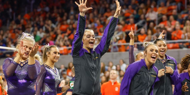 Olivia Dunne cheers her team