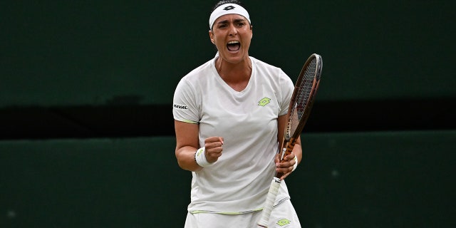 Ons Jabeur reacts on court