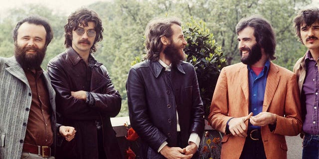 The Band poses for portrait photo in London