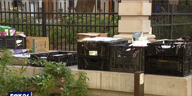 Nonperishable food donations can be seen outside the Houston Public Library