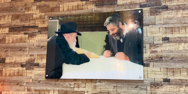 Avi Taub with Rabbi Menachem M. Schneerson