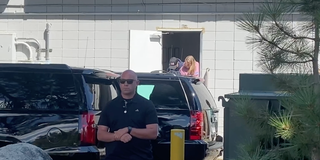 Hunter Biden is photographed ducking his head as he exits the building in Nevada on Wednesday.
