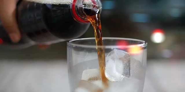 Soda pouring from a bottle