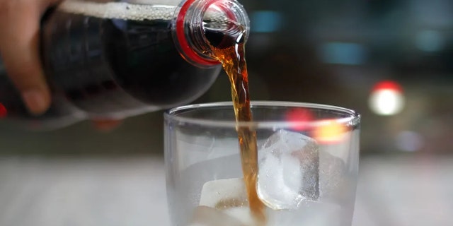 Soda pouring from a bottle