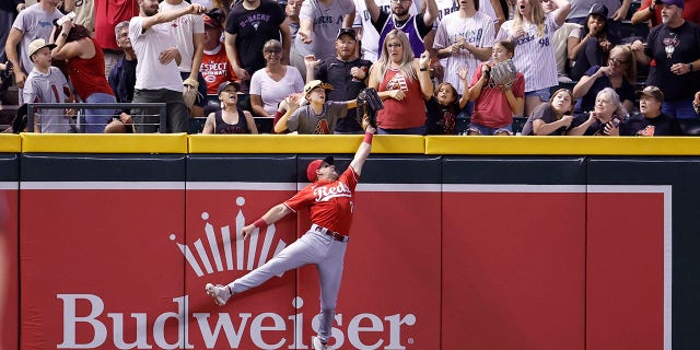 Spencer Steer tries to get a home run