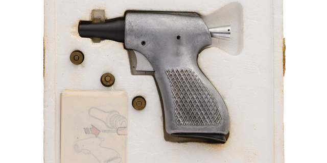 Elvis Presley's revolver, plus rare spy guns to hit auction block in ...