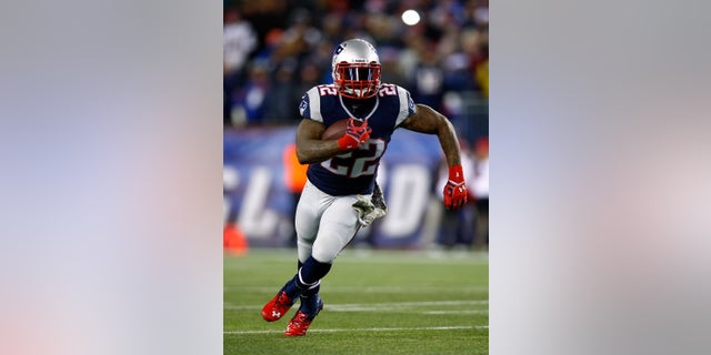 Stevan Ridley playing running back