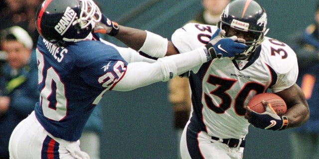 Terrell Davis stiff arm