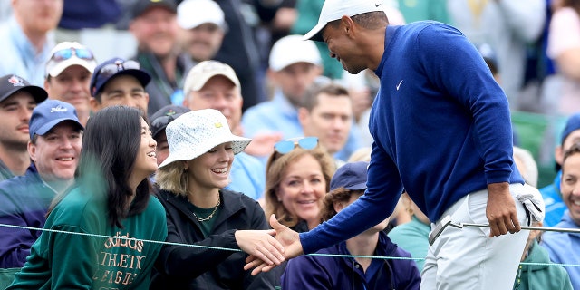 Tiger Woods and Rose Zhang