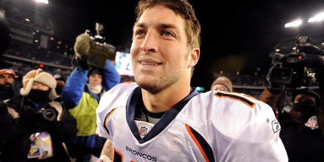 Tim Tebow walks off the field