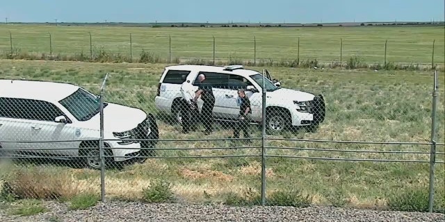 police respond to ax-wielding pilot by fence on airport property