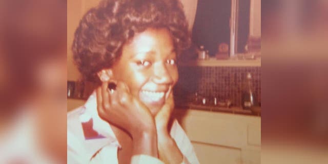 Murder victim Vicki Johnson is pictured smiling into the camera