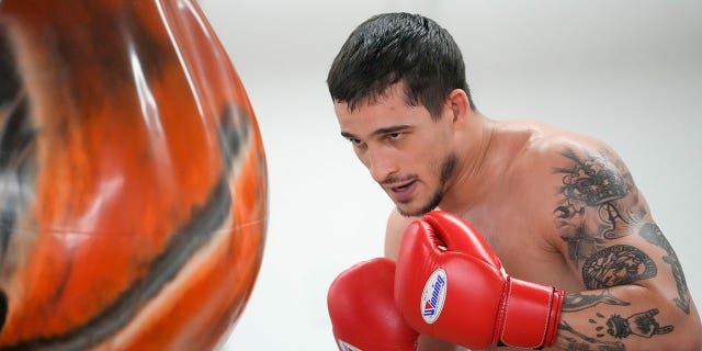 Biaggio Ali Walsh punches bag