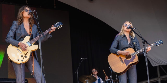 Aly & AJ performing