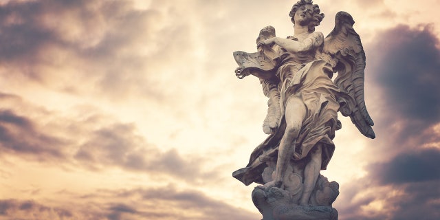 angel statue looking out