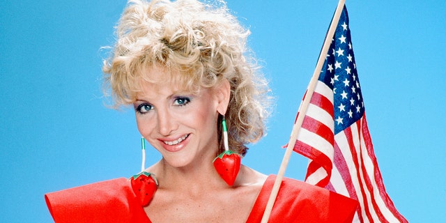 Days of Our Lives actress Arleen Sorkin holds American flag in portrait